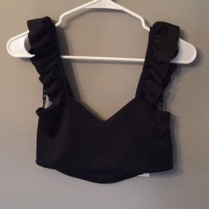 Black crop top. US 6